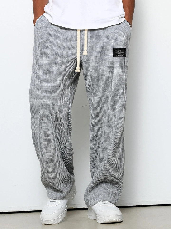 CORVANI | PANTALON AMPLE EN MAILLE GAUFRÉE BAPTISTIN HOMME
